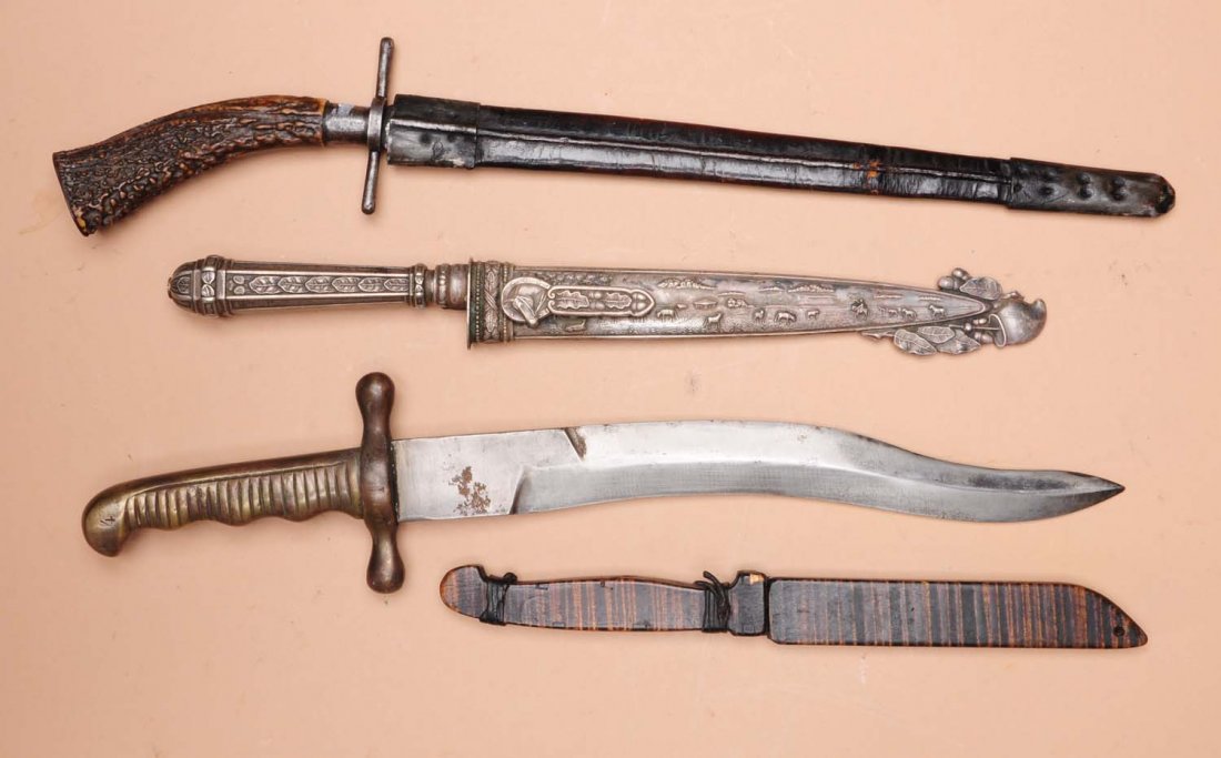 Lot of 4: Exotic Foreign Knives.: Lot includes: a Pundales Gaucho South American fixed blade knife with all metal mounts, circa 1950s, blade is 7" and etched with cowboys and cattle, overall length 11-1/4", and the entire knife has re