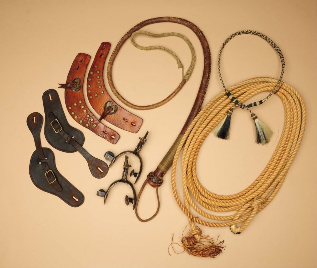 Lot of 6:: Including two sets of antique spurs straps, one cowboy larriet, one horse hair hat band,one pair of Chihuahua spurs, and one early bullwhip. Condition (Good). Size Largest: 59" L.