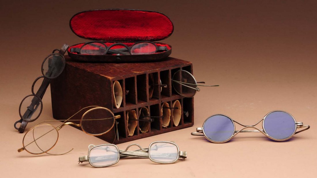 Box of Early Eyeglasses.: This lot includes approx. a dozen eyeglasses dating from the 1920s and earlier. Condition (Very Good Plus). Size Largest : 4" L.