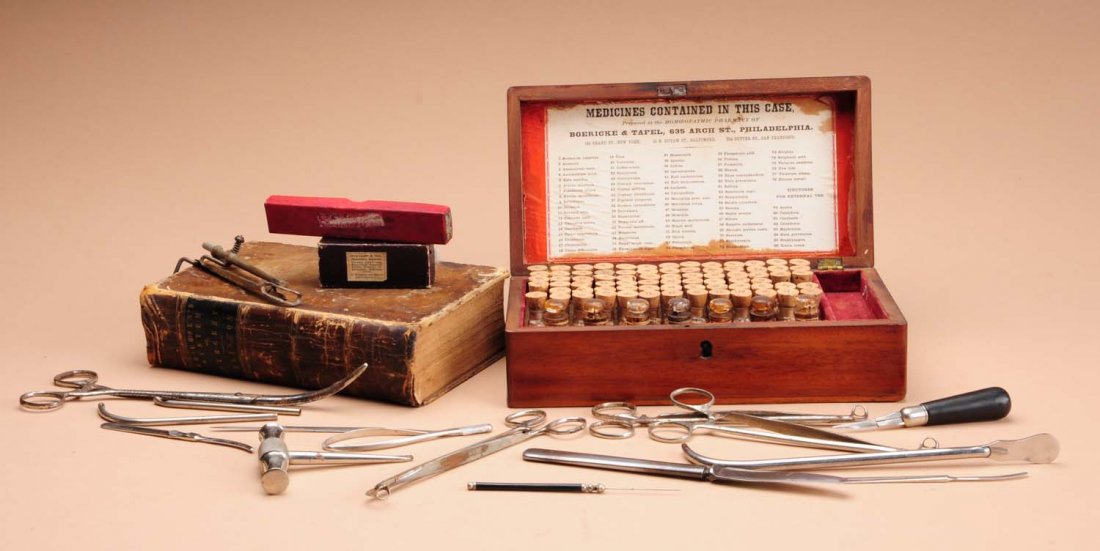 Lot of 19th Century Medical Items.: This lot includes numerous medical tools from the 19th century. Also included is a wooden case with numerous vials of medicine, and and 1854 edition of John Erichson's book "The Science and Art of Sur