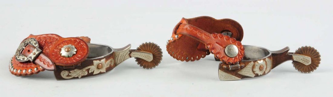 Old Signed Alward Spurs.: Marked "285 Alward" spurs with silver & copper overlays. Hand engraved. Show good wear and use. Leather has probably been replaced. Signed "Buddy Foster Maker, Decater, Texas". Condition (Good). Size 