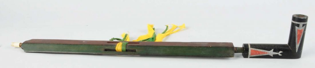 Great Lakes Chippewa Steatite.: Late 19th century - early 20th century. Pipestone and lead inlay pipe bowl with polychromed flat wooden stem. Condition (Good). Size 28" L.