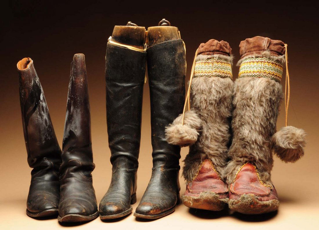 Lot of 3: Pairs of Shoes.: Two pairs of high top riding boots from the late 19th to early 20th century, and one pair of fur and commercial leather mukluks. Condition (Fair). Size Largest: 20" T.