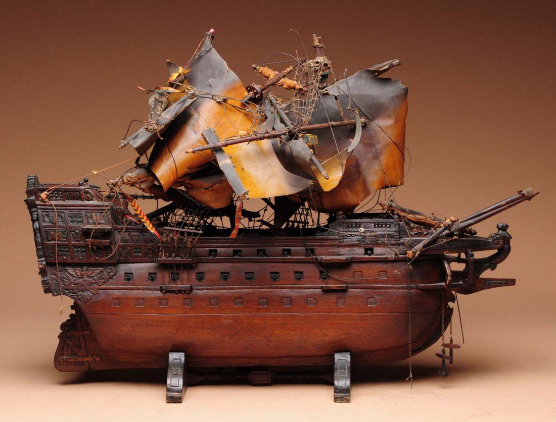 Early Masted Ship Model.: This ship model has damage to the mast and sails. The body of the ship is in fairly nice condition. Condition (Very Good). Size 25" L.