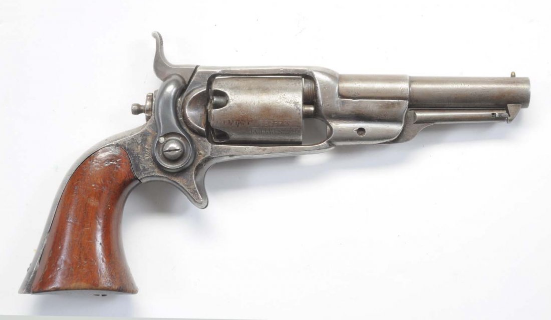 Colt Root Model 1855 Side Hammer Pocket Revolver.: Serial No. 10356. Standard revolver with round 3-1/2" barrel, .28 caliber, side hammer, spur trigger. Action is tight as new. Strong bore, but frosted. Gun is basically metal grey. Original walnut gri