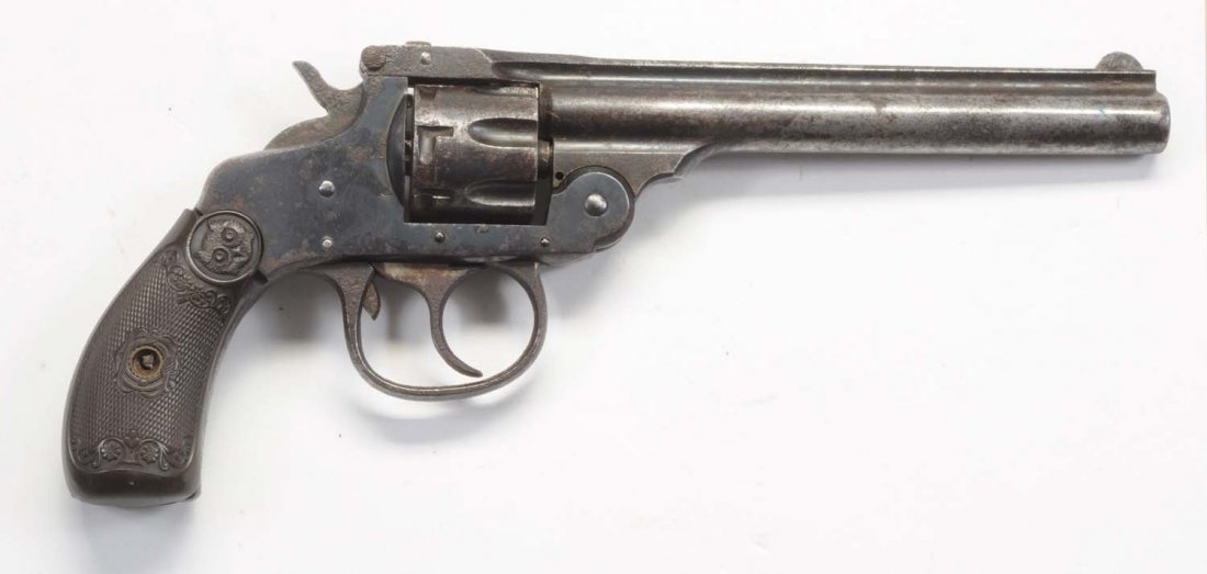 Iver Johnson Top Break .22.**: Serial No. A52310. All brown. Surface rust. Not working.