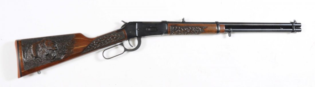 Winchester Model 94 E Caliber .307 Winchester.**: Serial No. 5519046. This is a modern standard carbine angle eject, chambered for the .307 Winchester. The metal is in as new condition. The front and rear sights have been replaced. Sling studs have b