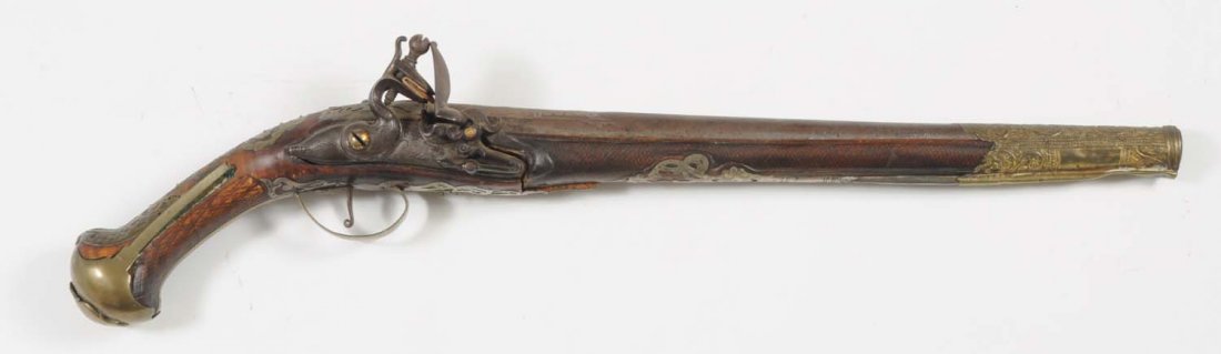 Pair of Flint Lock Single Shot Pistols.: Have 14-1/2" barrels engraved in the white. Brass inlaid and overlaid stocks. Flint lock .60 caliber. Both need work, both stocks are cracked. Both have metal pieces coming off of them.CORRECTION: The