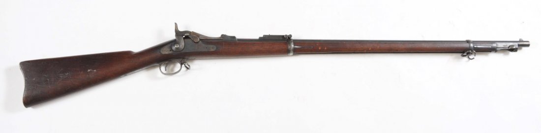 U.S. Springfield Model 1884 Trap Door Rifle.: Serial No. 110330. Standard rifle with all proper markings. 1884 on block. "Samuel Porter 1891" cartouche. Metal is fine, clean, blue mixed with brown. Excellent wood. Unit marked. Missing ramrod bayo