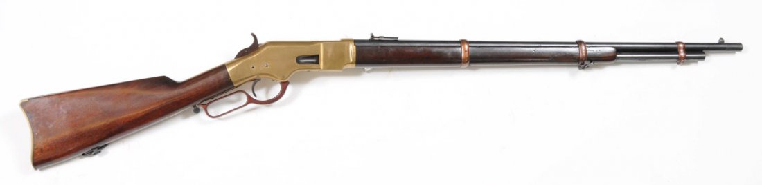 Winchester Model 1866 Musket.: Serial No. 77793. This musket features a 27" barrel, 24" tube, three barrel bands, .44 rimfire, and carbine butt plate. All blued metal parts have been refinished. Brass has been polished. Rear sight 