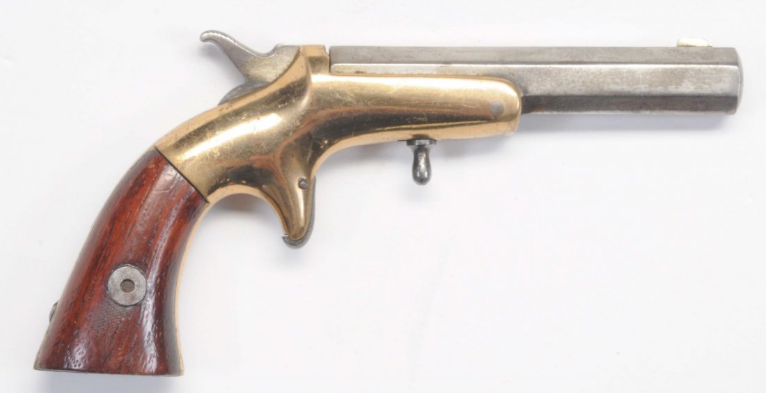 Frank Wesson Single Shot Pocket Pistol.: 3-1/2" octagon barrel, spur trigger, .30 caliber rimfire, single shot. Brass frame. Excellent bore. Works. No finish on barrel. Polished brass. Excellent grips.