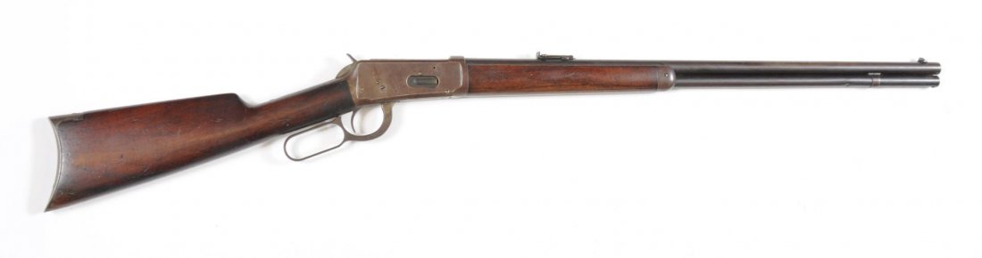 Standard Winchester Model 1894 Rifle.**: Serial No.562881. This rifle, manufactured in 1911, features a 26" round barrel, full magazine, rifle butt, a carbine style folding ladder rear sight, and is chamber in the .32-40 Winchester cartridge