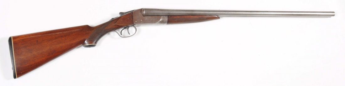 Ithaca Flues 16 Ga. SxS Shotgun.**: Serial No. 352815. Manufactured 1920. Barrel length: 28-1/8". Chamber length: 2-9/16". Choke dimension: R - IC, L - modified. Length of pull: 14-1/8". Drop on heel: 3-1/2". Steel barrels have no finis