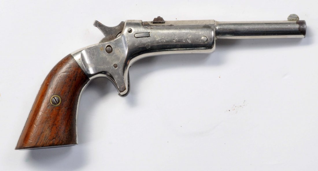 Stevens Old Model Pocket Pistol.: .22 rimfire, 3-1/2" part octagon barrel, tip-up, spur trigger. Rear sight cut into barrel. Nickel plated, retains 85%. Very good bore. Not working.
