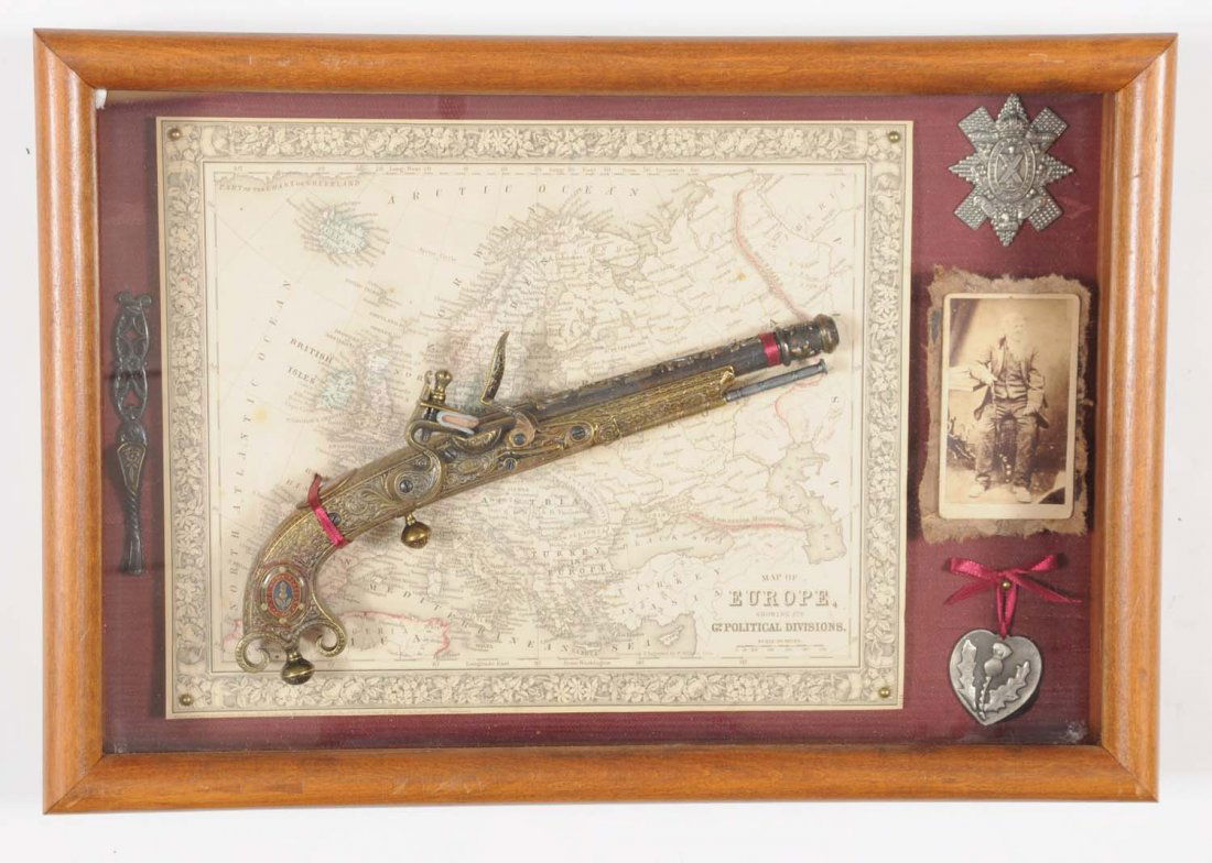 Framed Replica Scottish Metal Flintlock Pistol D: No serial number. Nice shadow box display features a modern cast Scottish flintlock pistol with map, old CDV and some medals. Great office piece.