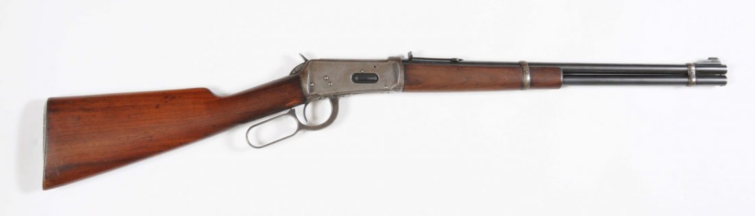 Standard Model Winchester Pre-War Carbine**: Serial No. 1159030. Standard pre-war carbine manufactured in 1938. Features 20" round barrel, full magazine, ramp front site, sporting rear, steel shotgun buttplate. Wood stocks are excellent, never s