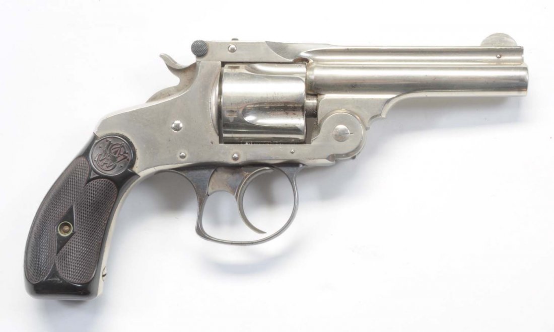 S&W.38 Double Action 3rd Model Revolver.: Serial No. 152757. 1884-1895. Standard top break .38 double action. Chambered for the .38 Smith & Wesson caliber. It retains approximately 90% of the original nickel finish. Excellent original grips.