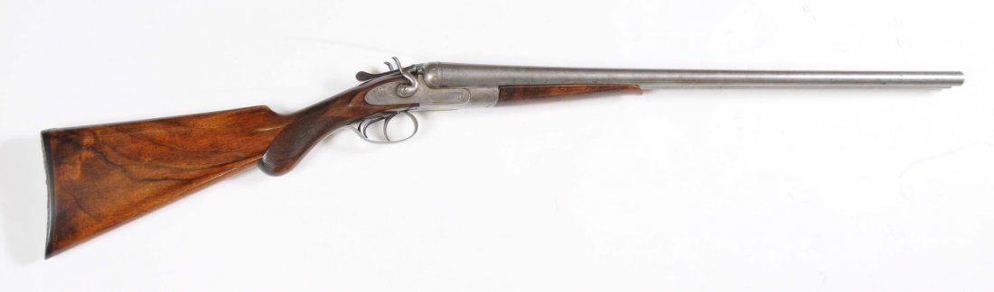 The Continental Hammer 12 Ga. SxS Shotgun.: Serial No. 21453, Manufactured 1890. Barrel length: 28-1/2". Chamber length: 2-5/8". Choke dimension: R - cylinder; L - modified. Length of pull: 14-3/8". Drop on heel: 3-1/4". The barrel retains much