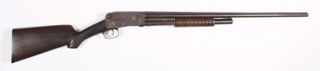 Union Firearms Spencer Clone Shotgun.**: Serial No. 7013. Manufactured 1903 - 1913. Barrel length: 32". Choke dimension: full. Length of pull: 12-7/8". 12 gauge, pump-action. Barrels and frame are patina with brown; bore is bright with pitti
