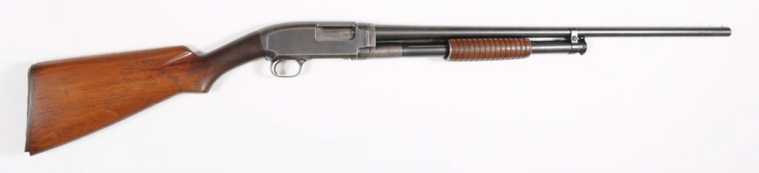 Winchester 12 Takedown Pump-Action Shotgun.**: Serial No. 625221. Manufactured 1930. Barrel length: 28". Chamber length: 2-3/4". Choke dimension: modified. Length of pull: 13-5/8". Drop on heel: 2-3/4". Barrels have 50% thinning blue; frame has li