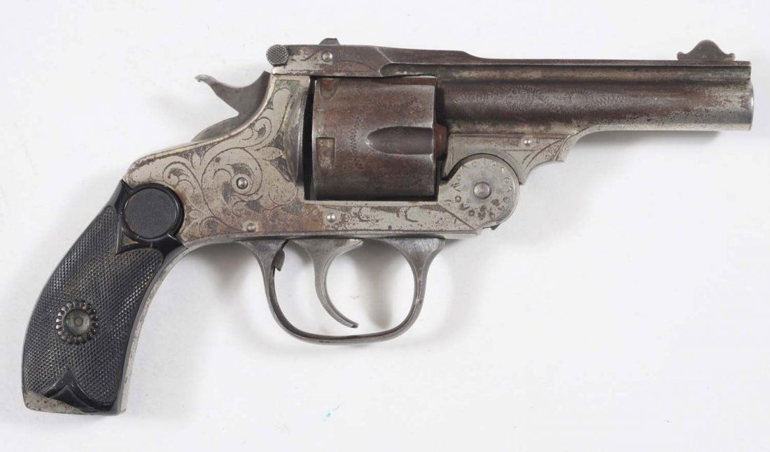 Eastern Arms Co. Top Break Dbl. Action Revolver.: Engraved. Serial No. 141. Typical tope break double action turn of the century revolver in nickel finish with simple engraving, five shot, .38 caliber, and double action. Revolver functions in double