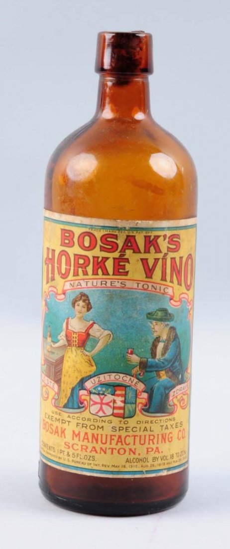 Basak's Horke Vino Tonic Bottle.: This bottle has a good front label, but the label on the reverse has loss. Condition (Very Good). Size 9" T.