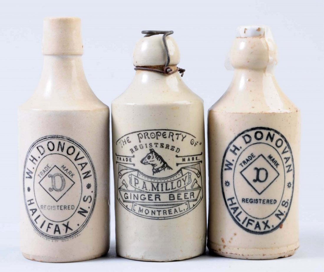 Lot of 3: Stoneware Beverage Bottles.: This lot includes two bottles from W.H Donovan Halifax, N.S. and one bottle for P. A. Milloy Ginger Beer Bottle Montreal. Condition (Excellent). Size Largest: 7" T.