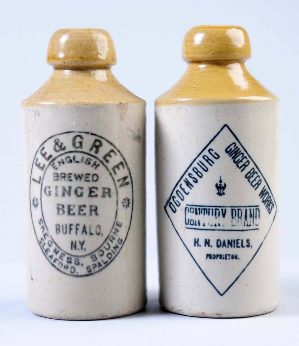 Lot of 2: Stoneware Ginger Beer Bottles.: The first bottle is marked "Lee & Green English Brewed Ginger Beer Buffalo, NY." The second bottle is marked "Ogdensburg Ginger Beer Works Century Brand" Condition (Excellent). Size Each: 7" T.