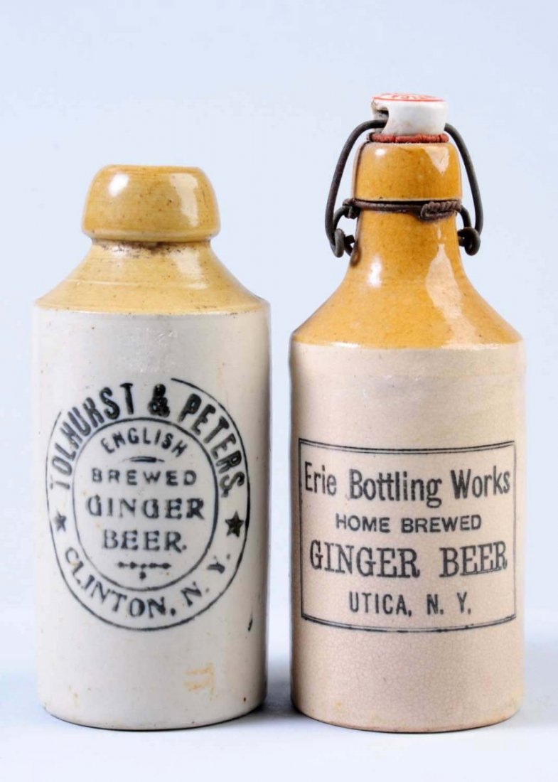 Lot of 2: Stoneware Ginger Beer Bottles.: The first bottle is marked "Erie Bottling Works Home Brewed Ginger Beer Utica, NY." The second bottle is marked "Tolhurst & Peters English Brewed Ginger Beer Clinton, NY." Condition (Excellent). Size 