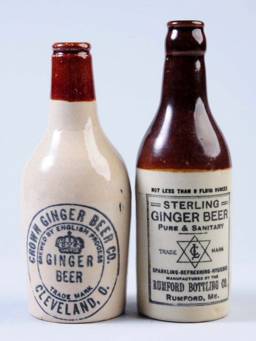 Lot of 2: Stoneware Ginger Beer Bottles.: First bottle is marked "Sterling Ginger Beer Rumford, Maine" Second bottle is marked "Crown Ginger Beer Cleveland, Ohio". Condition (Very Good Plus). Size Largest: 8" T.