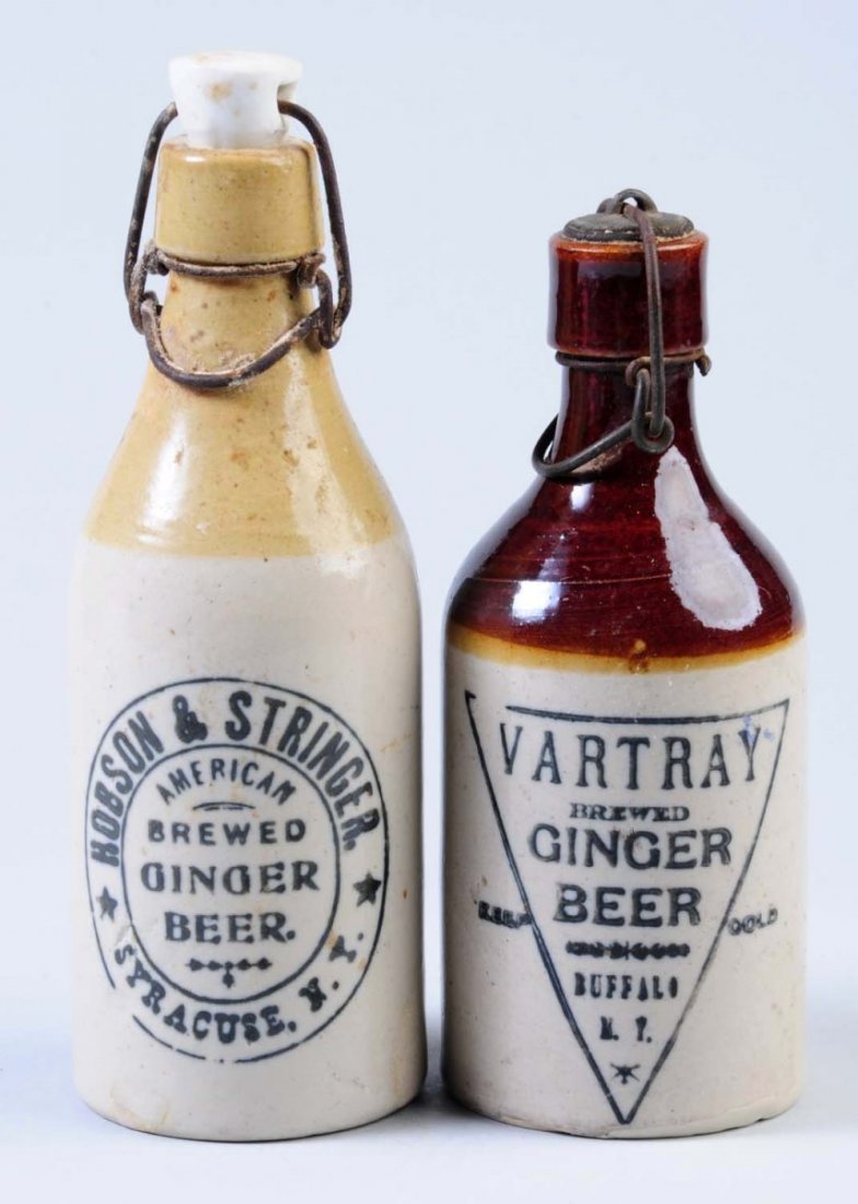 Lot of 2: Stoneware Soda Bottles.: First bottle marked "Hobson & Stringer Ginger Beer from Syracuse, NY." Second bottle is marked "Vartray Ginger Beer from Buffalo NY.". Condition (Very Good Plus). Size Largest: 8 - 1/4" T.
