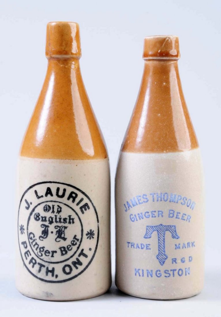 Lot of 2: Stoneware Ginger Beer Bottles.: First bottle is marked "James Thompson Ginger Beer Kingston" Second bottle is marked "J. Laurie Ginger Beer Perth, Ont.". Condition (Very Good Plus). Size Largest: 9" T.