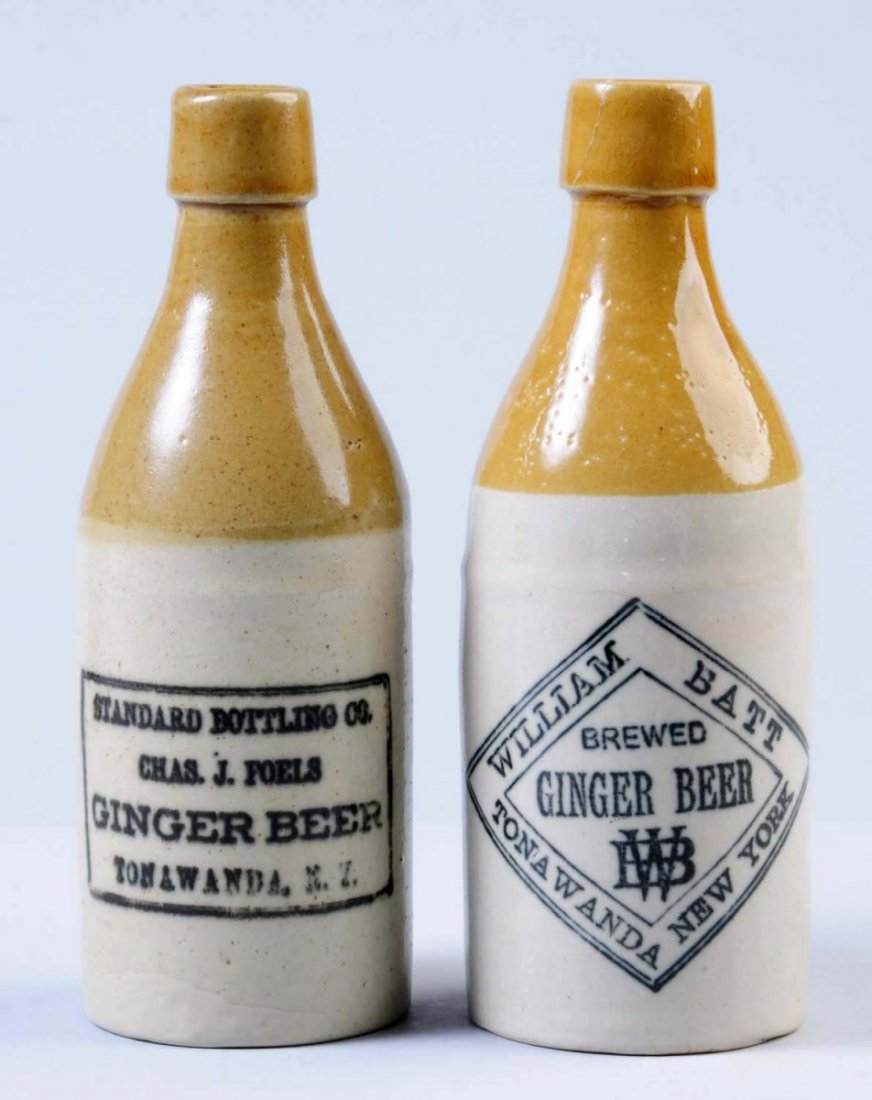 Lot of 2: Stoneware Ginger Beer Bottles.: The first bottle is marked "William Batt Brewed Ginger Beer Tonawanda, NY. " The second bottle is marked "Charles J. Foels Ginger Beer Tonawanda, NY." Condition (Excellent). Size Each: 7 - 1/2" T.