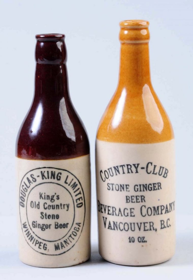 Lot of 2: Stoneware Ginger Beer Bottles.: First bottle is marked "Country Club Stone Ginger Beer Vancouver, B.C." Second bottle is marked "Douglas King Limited Kings Old Country Stone Ginger Beer Winnipeg, Manitoba." Condition (Excellent). Si