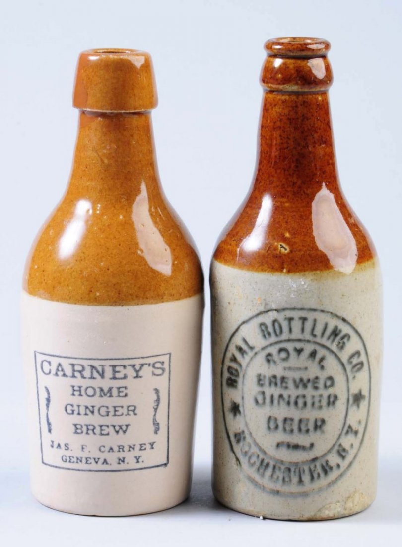 Lot of 2: Stoneware Ginger Beer Bottles.: First one is marked "Carney's Home Ginger Brew Geneva, NY" Second bottle is marked "Royal Brewed Ginger Beer Rochester, NY" This bottle has some blurring to the label. Condition (Very Good). Size Each