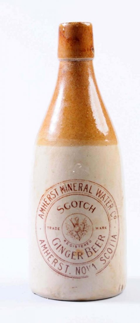 Amhurst Scotch Ginger Beer Stoneware Bottle.: This Amhurst Mineral Water Co. scotch ginger beer bottle has some staining here and there. Condition (Very Good Plus). Size 9" T.