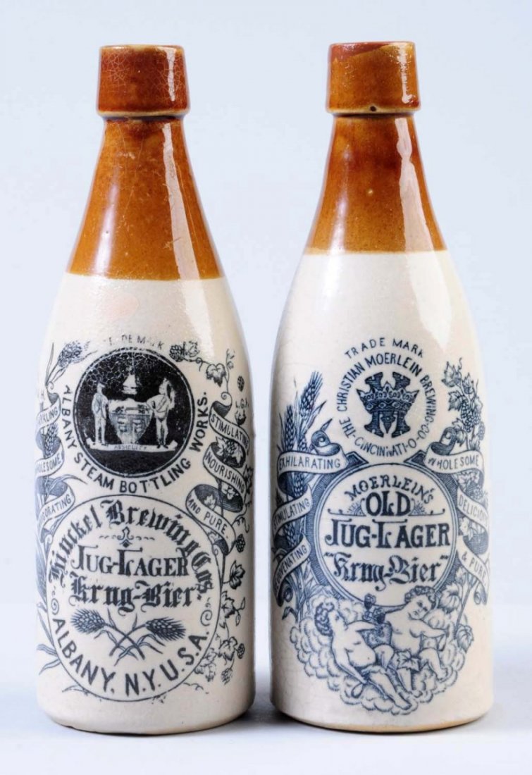 Lot of 2: Stoneware Beer Bottles.: The first bottle is for Jug Lager from The Albany Steam Bottling Works in Albany, NY. The second bottle is for Moerlein's Old Jug Lager from The Christian Moerlein Brewing Company in Cincinnati, OH. T
