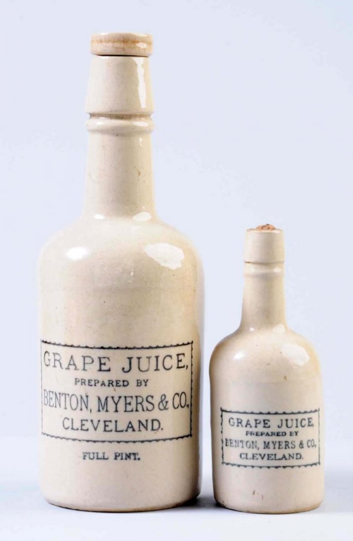 Lot of 2: Benton Myers Stoneware Bottles.: The first grape juice bottle is a pint bottle, the second bottle is a much smaller bottle that maybe have been a sample. Condition (Excellent). Size Largest: 9" T.