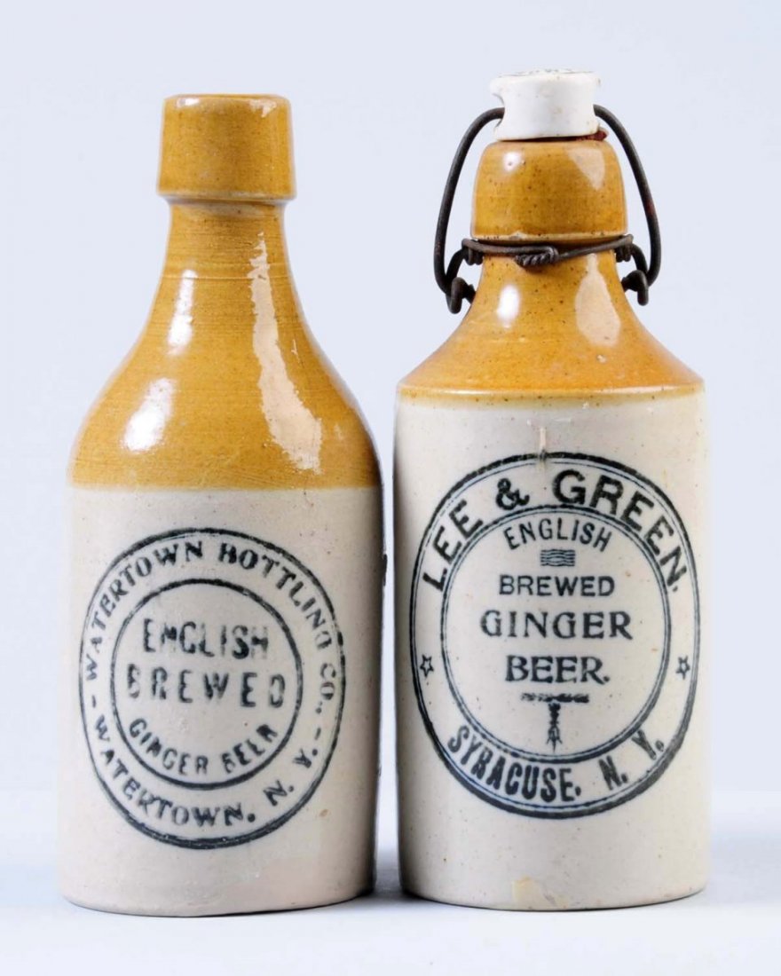 Lot of 2: Stoneware Ginger Beer Bottles.: One bottle is from Lee & Green, and the other is from Watertown Bottling Co. Both bottles are from New York. The Watertown bottle has a repair at the base. Condition (Very Good Plus) Size Largest: 7 -