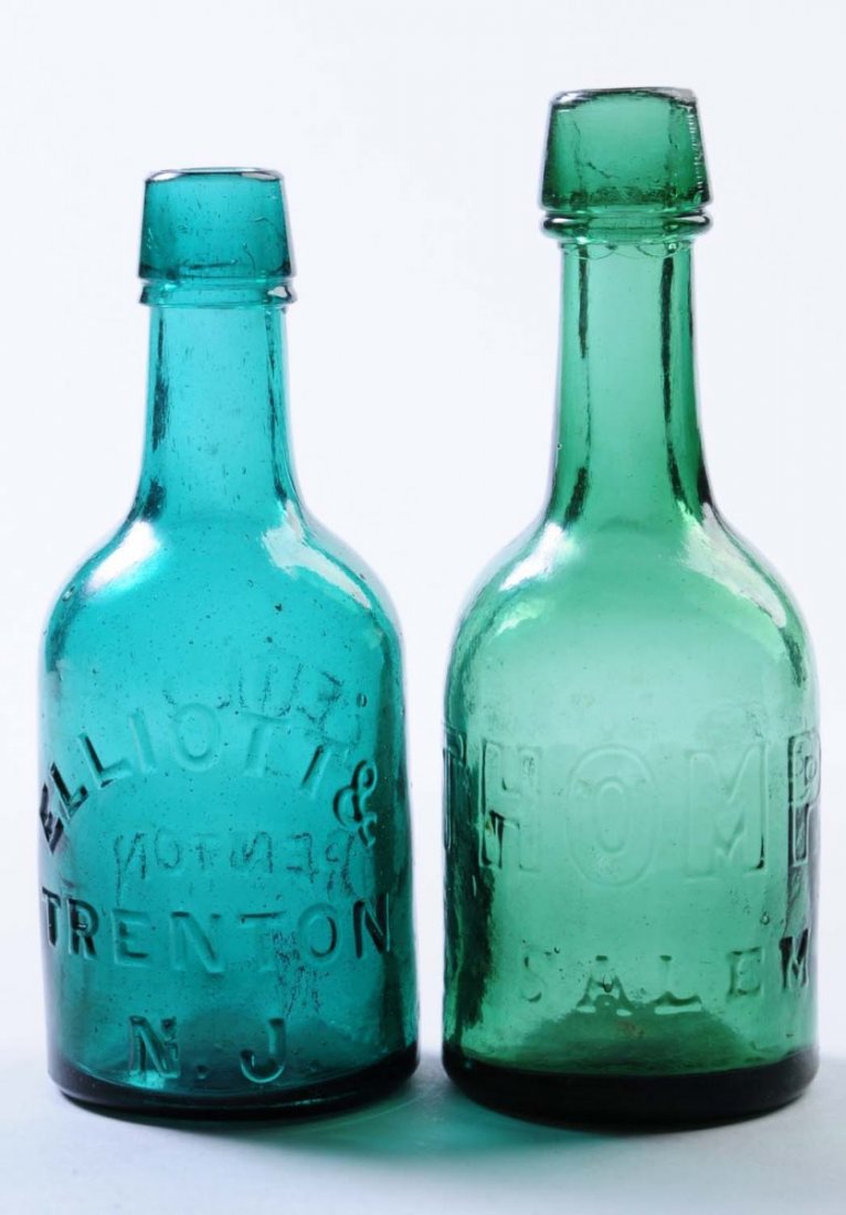 Lot of 2: Early Beer Bottles - New Jersey.: This lot includes: a green bottle from J. Thomson is Salem and a turquoise bottle from Elliott and Ledlie in Trenton. Condition (Excellent). Size Largest: 7 - 1/4" T.