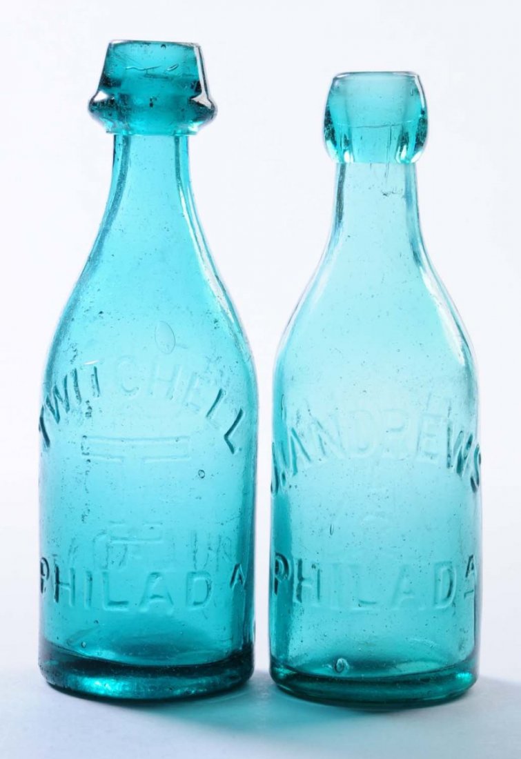 Lot of 2: Early Beer Bottles - Philadelphia.: This lot includes: a turquoise bottle from J. Andrews and another turquoise bottle from Twitchell. Condition (Very Good Plus). Size Largest: 7 - 1/2" T.