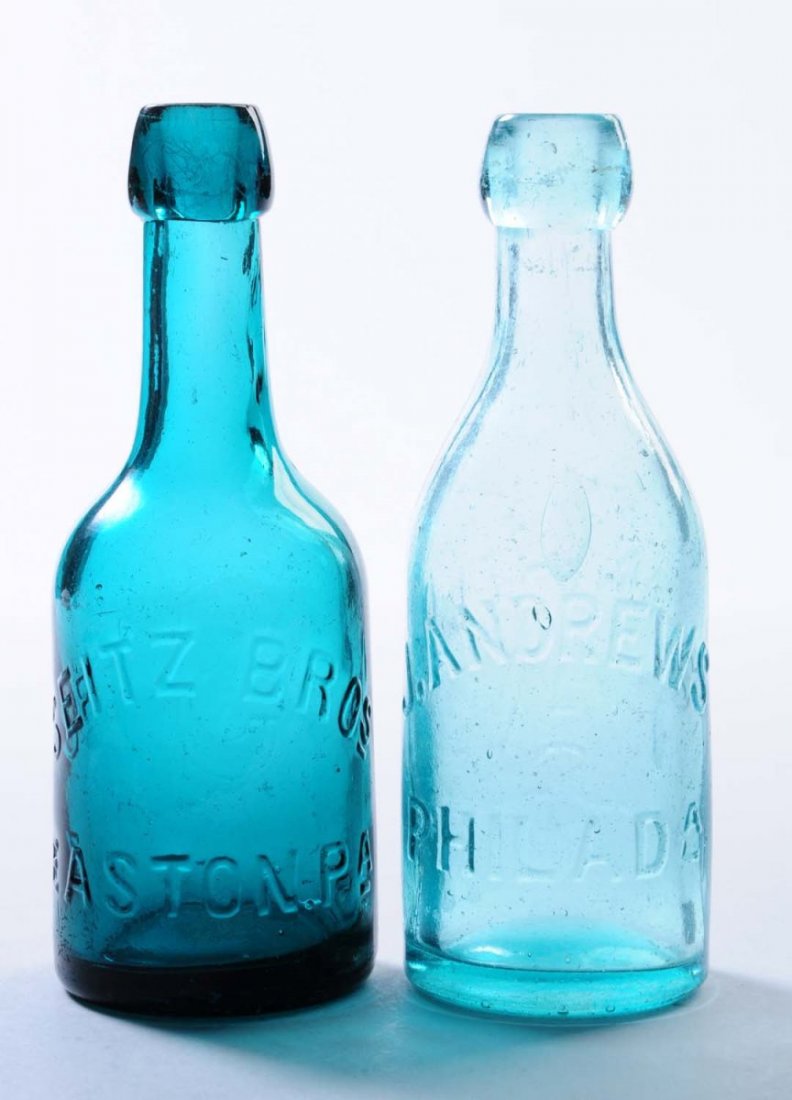 Lot of 2: Early Beer Bottles - Pennsylvania.: This lot includes: a turquoise bottle from Seitz Bros. in Easton and a J. Andrews bottle from Philadelphia. Condition (Excellent). Size Each: 7 - 1/4" T.
