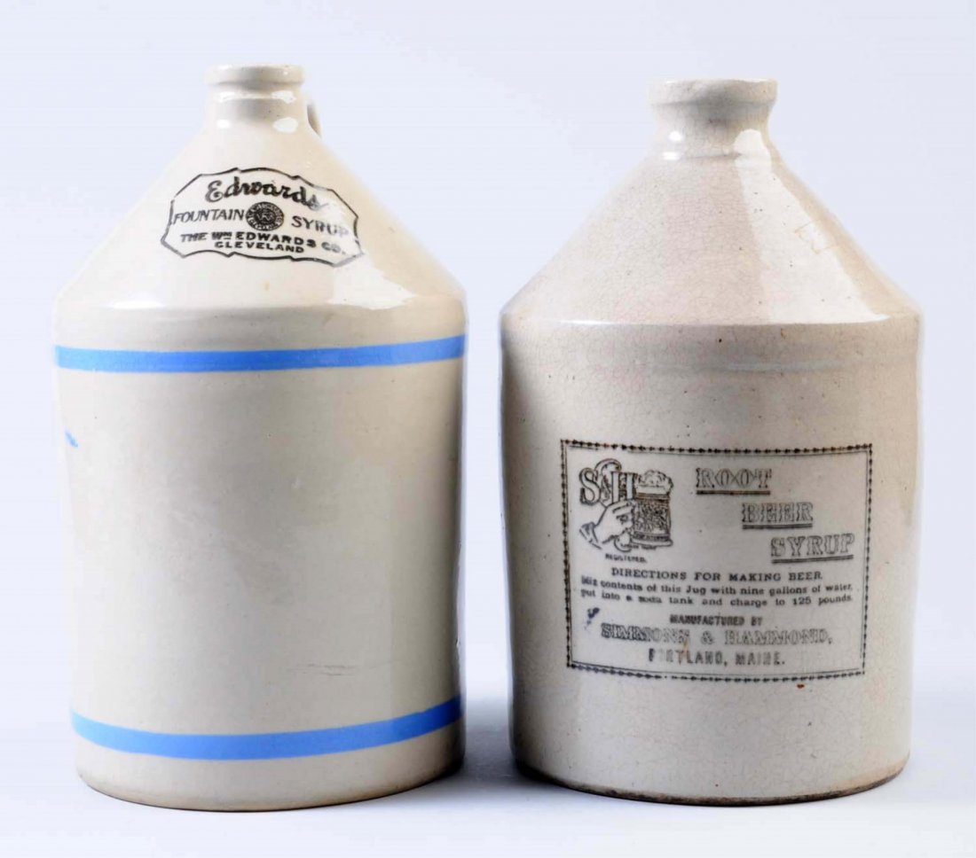 Lot of 2: One Gallon Stoneware Jugs.: The first bottle is marked "Edwards Fountain Syrup Cleveland, OH." The second bottle is marked "S & H Root Beer Syrup Portland, Maine." This just has overall crazing. Condition (Very Good). Size Large