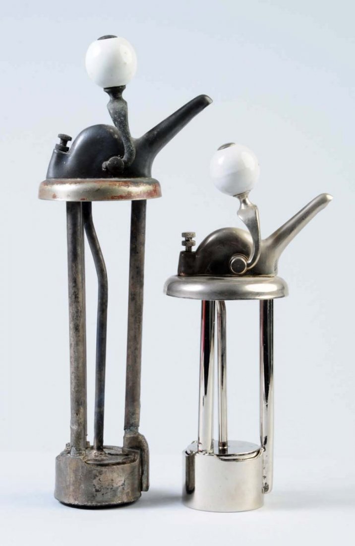 Lot of 2: Soda Dispenser Taps.: One tap is in excellent condition, the other tap has heavy corrosion and de coloration. Condition (Very Good). Size Largest: 15" L.