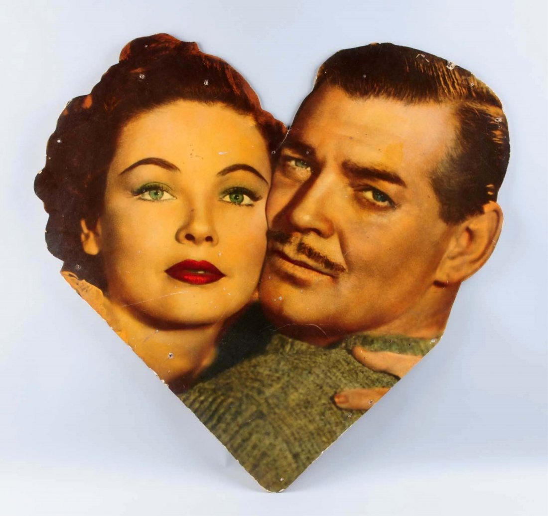 Clark Gable-Jean Tierney Promo Sign.: This heavy cardboard sign depicts Vivian Leigh and Clark Gable from "Gone with the wind" Several poke holes throughout. Condition (Very Good). Size 35" x 35".CORRECTION: This heavy cardboard sign depi