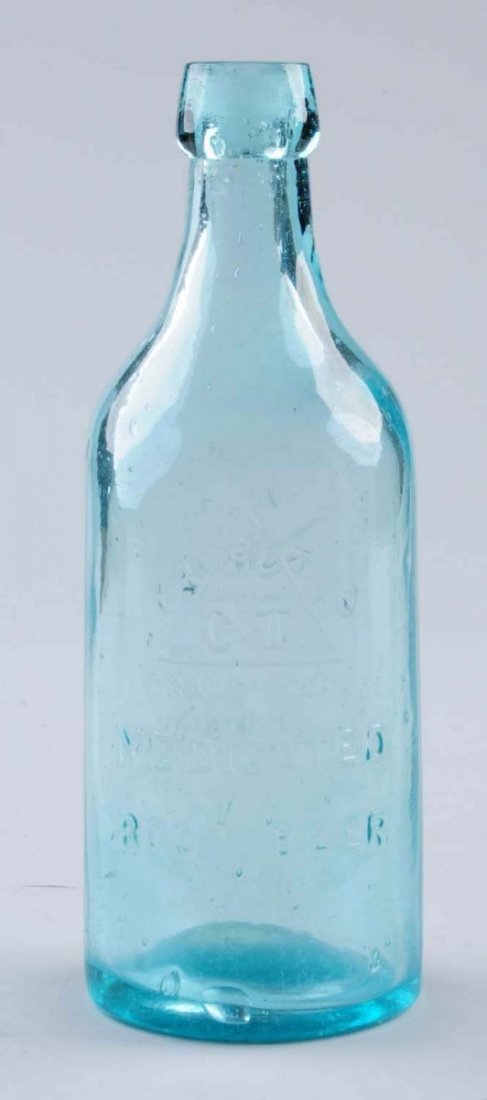 C. Torney Medicated Root Beer Bottle.: This Torney Root Beer bottle has no damage, just some great early bubbles. Condition (Excellent). Size 10 -1/2"L.