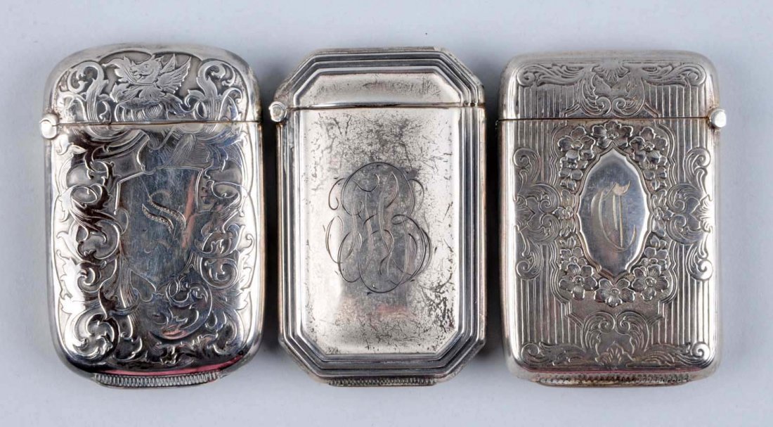 Lot of 3: Sterling Silver Match Safe Vestas.: Includes one plain with initials HFB by Webster Co., one floral motif by Webster Co., and one scroll with flying horse by Webster Co. Strong hinges. No dents. Condition (Excellent). Size Each: 2 - 1/2