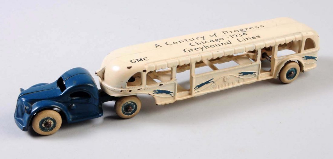 Arcade Cast Iron Greyhound Bus.: There are slight scratches to the paint of the bus. Toy appears to have been repainted. Includes original rubber wheels. On the top of the bus is written "A Century of Progress 1934". Condition (Very 