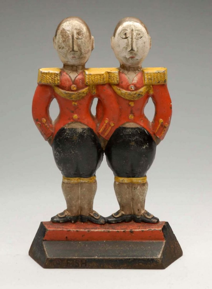 Cast Iron Small Footman Doorstop.: Hubley, “© Fish, 272”. Condition (Very Good). Size 9" L.