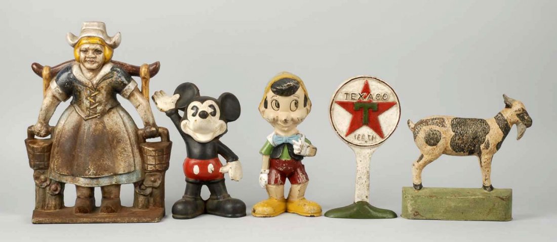 Lot of 5: Cast Iron Assorted Doorstops.: All reproductions or contemporary. Mickey and Pinocchio are banks/doorstops. Condition (Good). Size Tallest: 13 - 1/2" T.